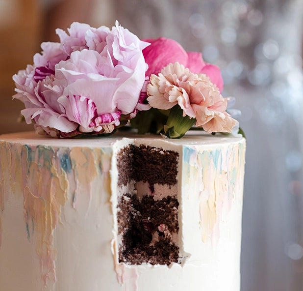 Suesse Freunde Styled Shoot Hochzeitstorte Anschnitt